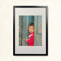 Red kid in blue door